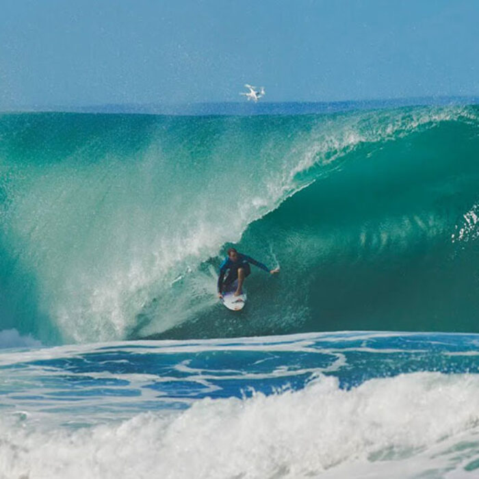 Jamie O'Brien surfing a wave at Pipeline