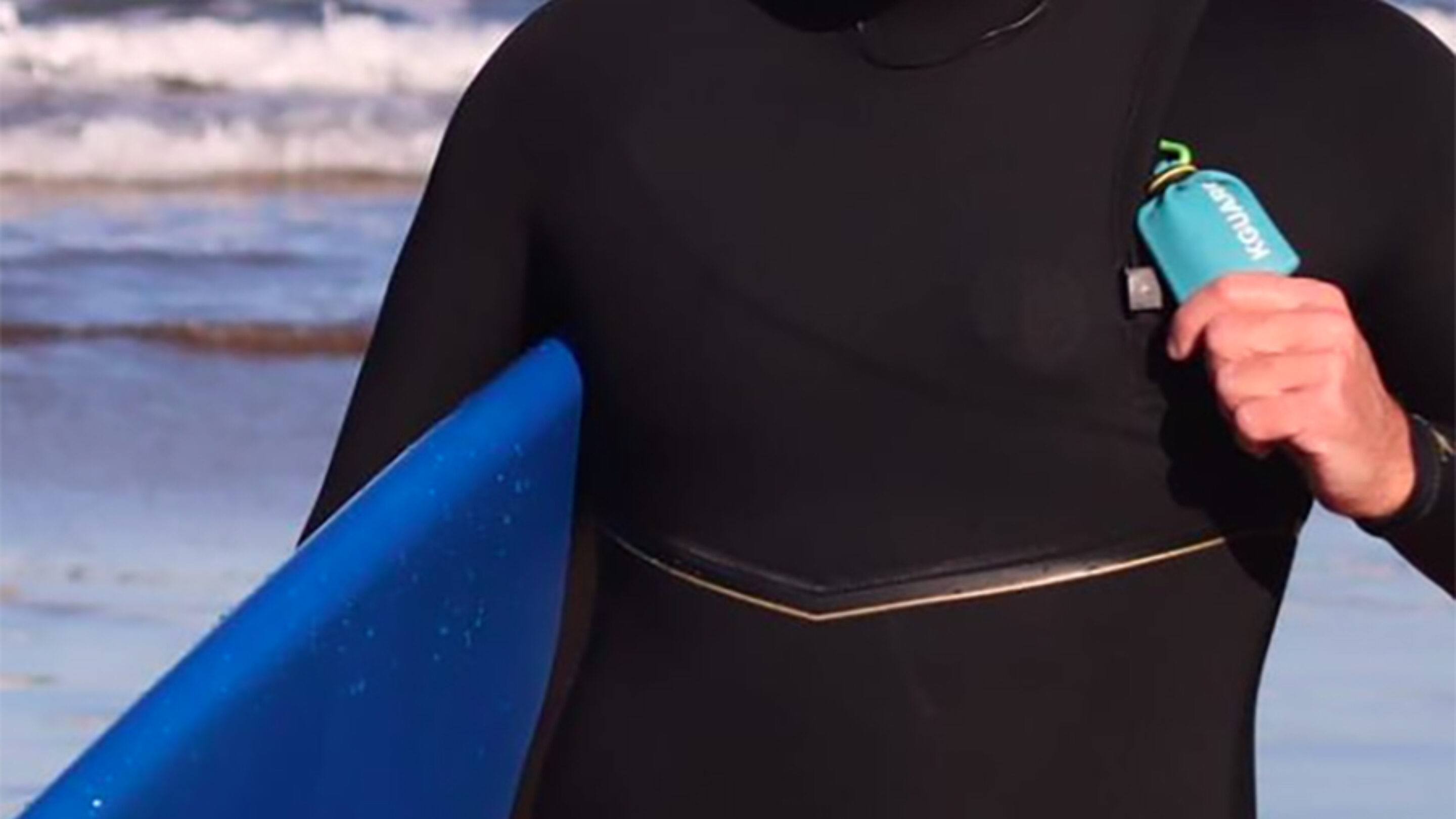 A waterproof pouch to carry an electric car key into the surf