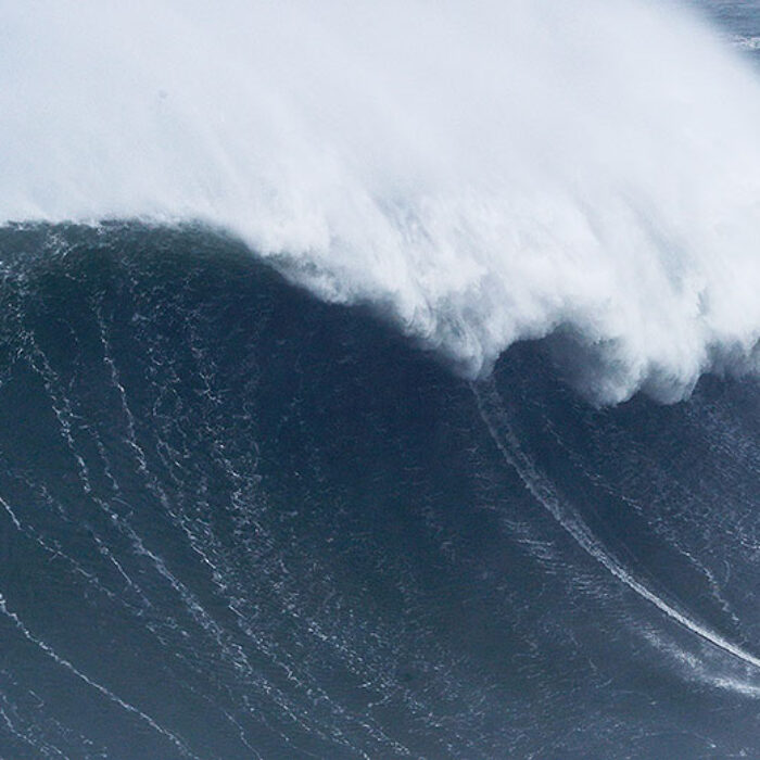 Surfer at Nazare in Portugal