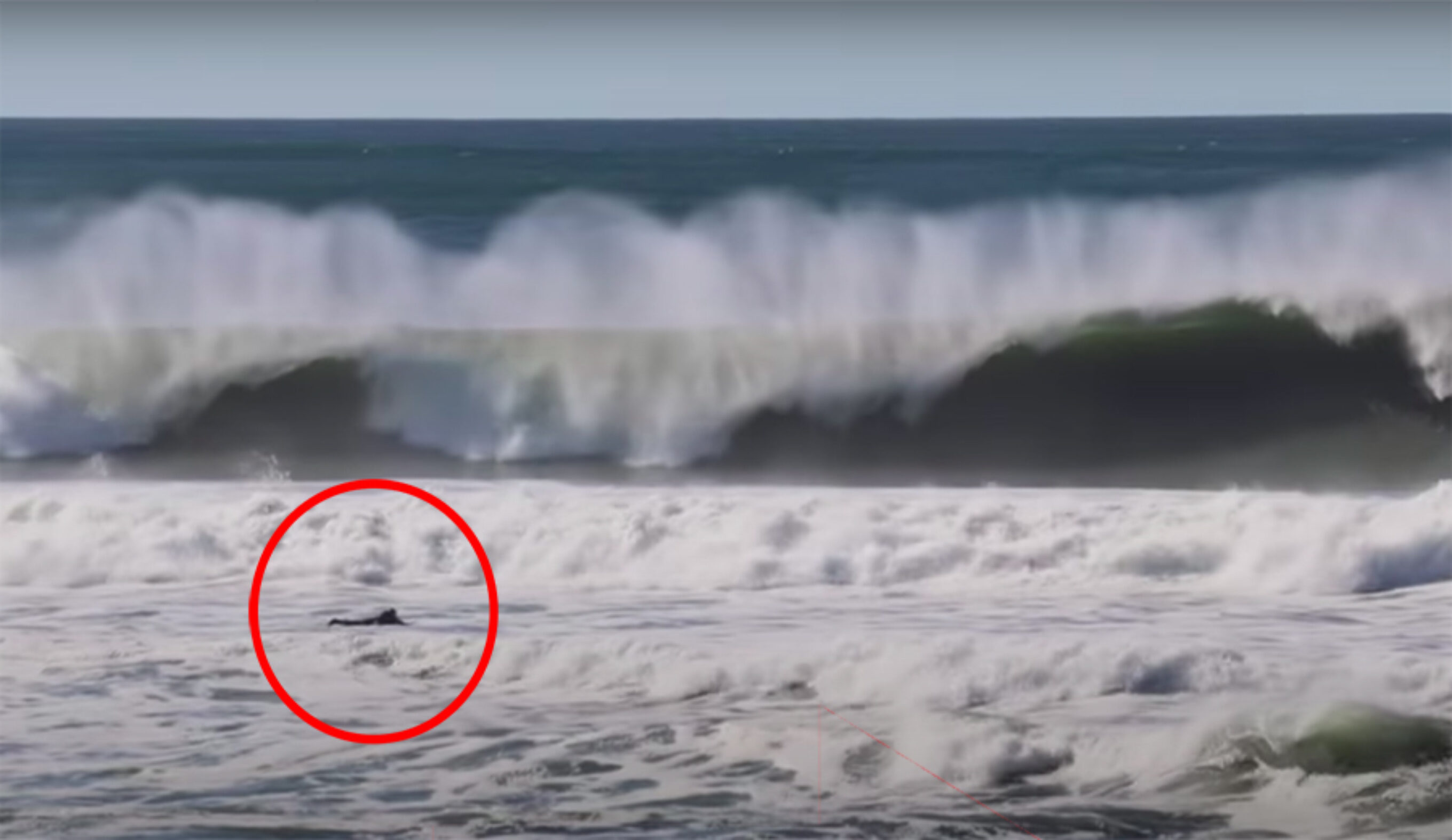 Unidentified Solo Surfer Shows What it Takes to Paddle Out at Maxing Ocean Beach