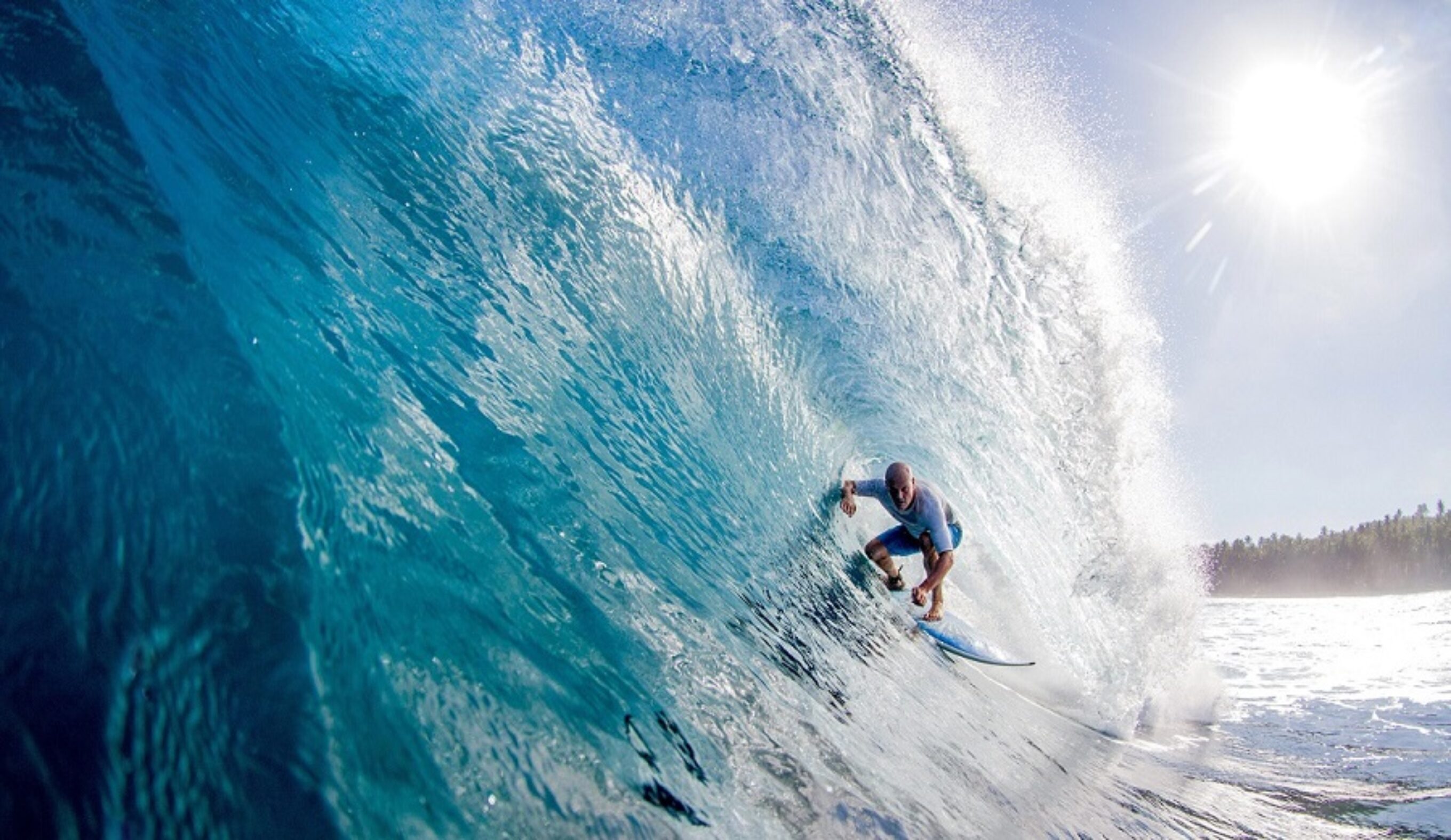 cameron lindsey deep in a sumatran barrel shot by tom woods