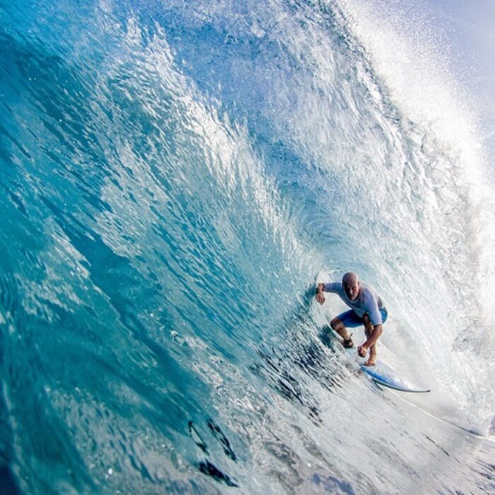 cameron lindsey deep in a sumatran barrel shot by tom woods