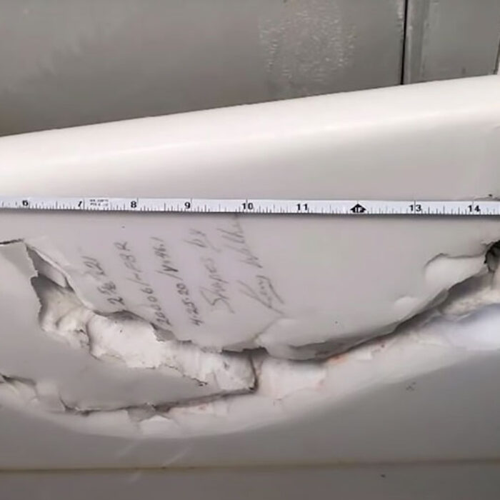 Surfboard bitten by shark at Honolua Bay