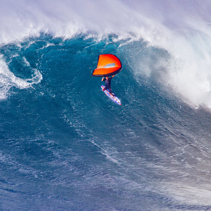 Kai Lenny wing surfing at Jaws