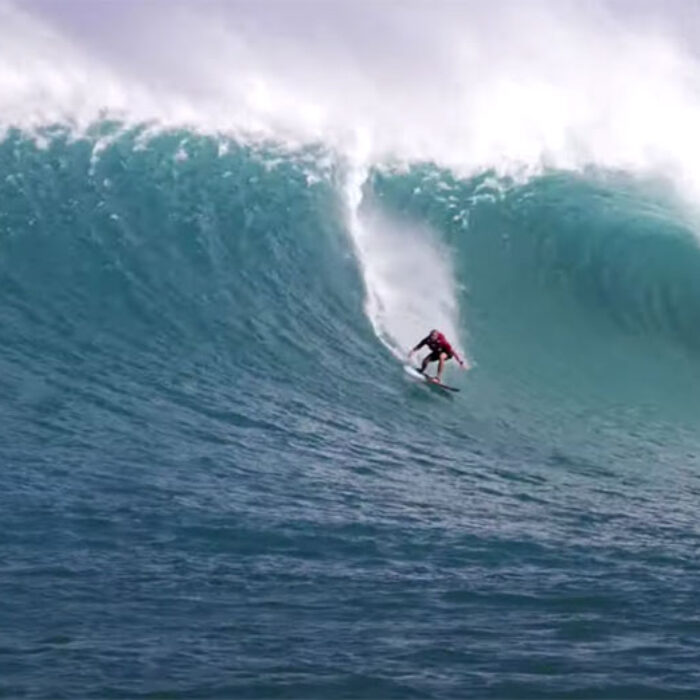 Ben Gravy tow surfing big wave on the North Shore