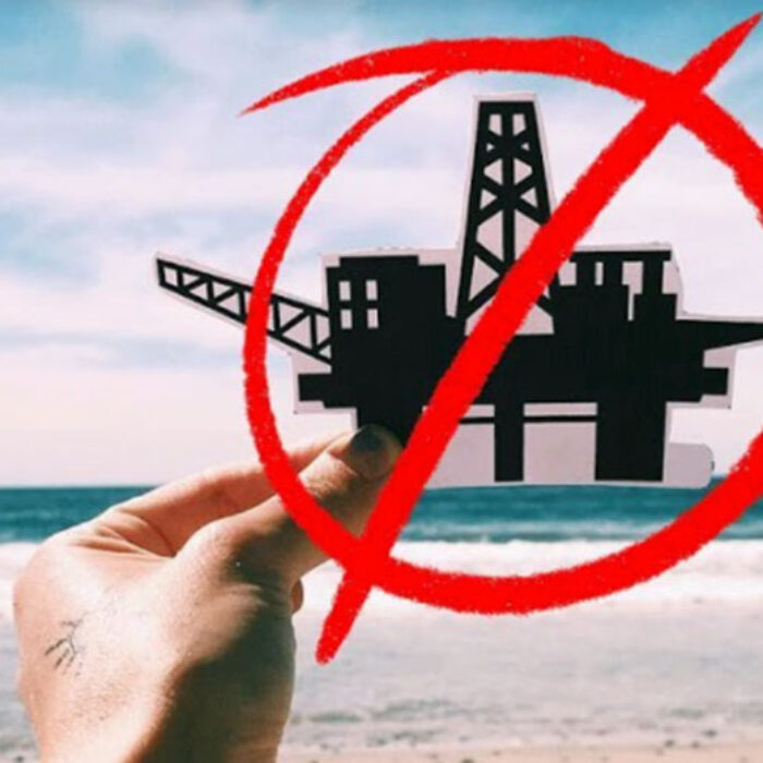 Oil derrick on Pacific coastline