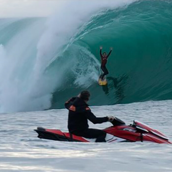 Surfer John Mel catches a left at Maverick's