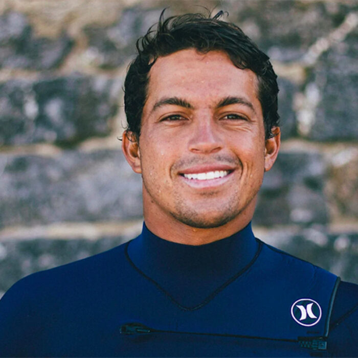 Kai Lenny in his wetsuit ready to surf