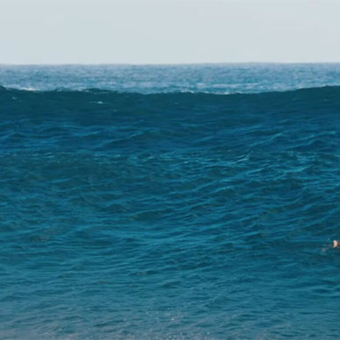 koa rothman on a wave at Pipeline