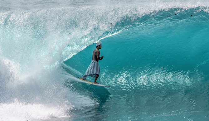 Koki Hendrawan in a barrel at Padang Padang