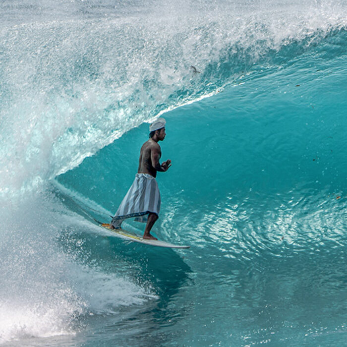 Koki Hendrawan in a barrel at Padang Padang
