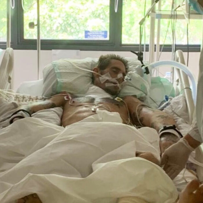 Brad Masters in a Bali hospital bed
