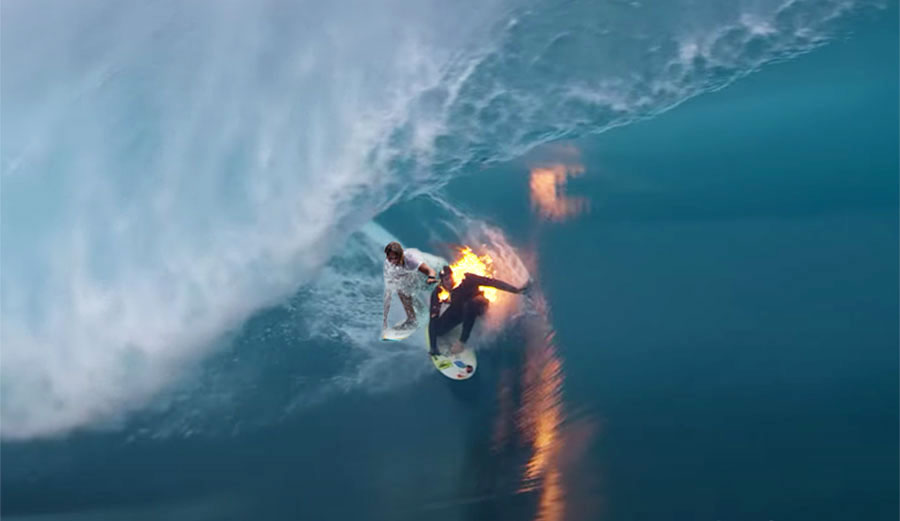 two surfers in barrel at Teahupoo