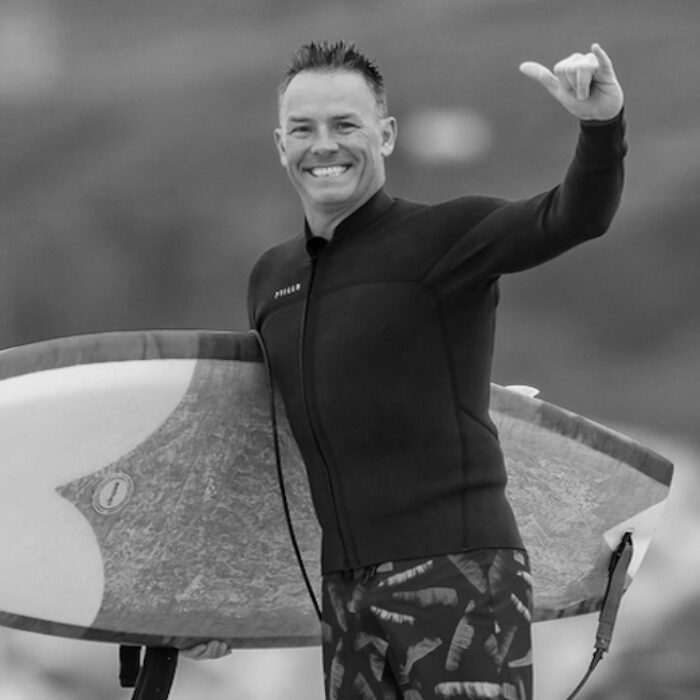 World Surf League CEO Erik Logan goes for a surf