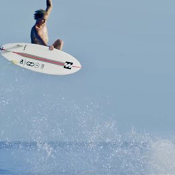 Finn McGill surfing on a Slater Designs surfboard
