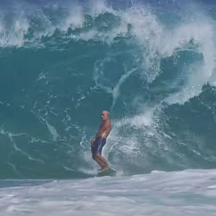 Michael Ho surfing on the North Shore