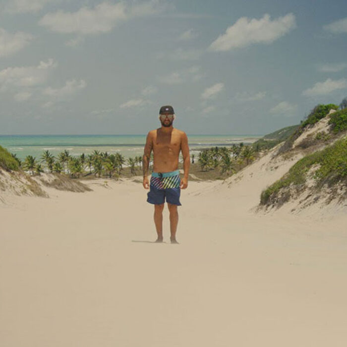 Italo Ferreira standing on a beach