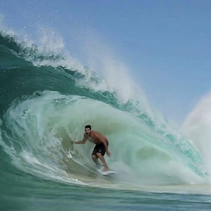 surfer in barrel at Kirra