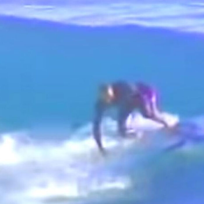 Todd Chesser on broken surfboard