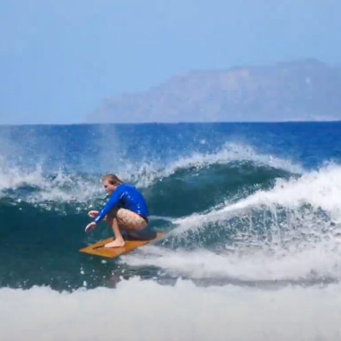Ben Gravy surfing plywood surfboard