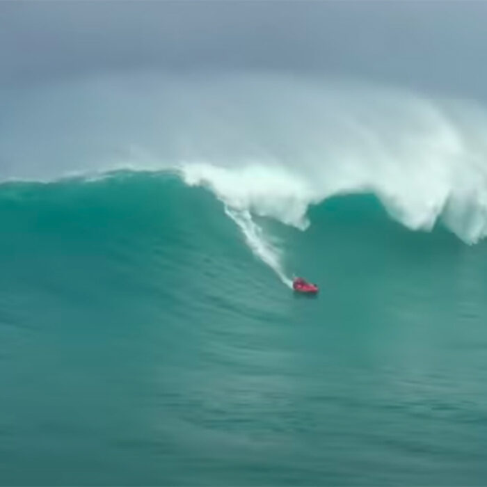 Riding a big wave on a raft