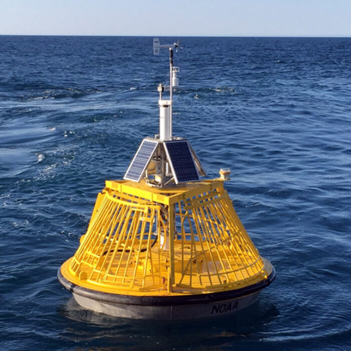 A buoy that gives wave height and wind informations sits in the ocean