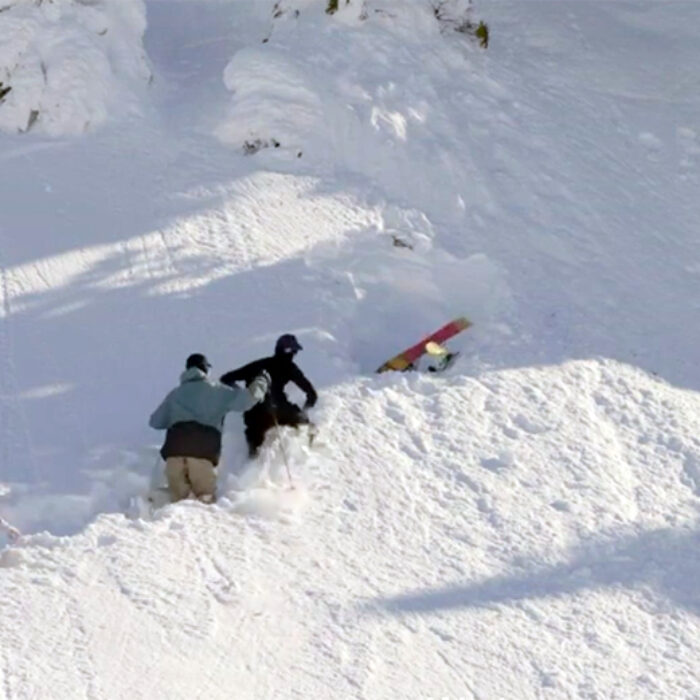 Skier Ahmet Dadali is buried upside down in the snow