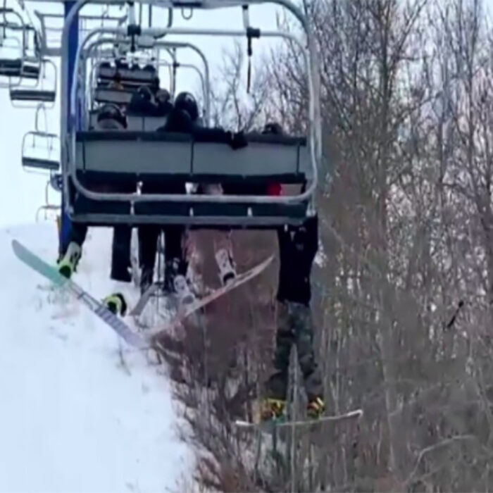 A 12-year-old hangs from a chairlift in Saskatchewan, Canada