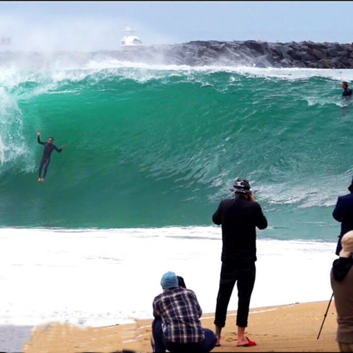 A surfer wrecks at the wedge in newport