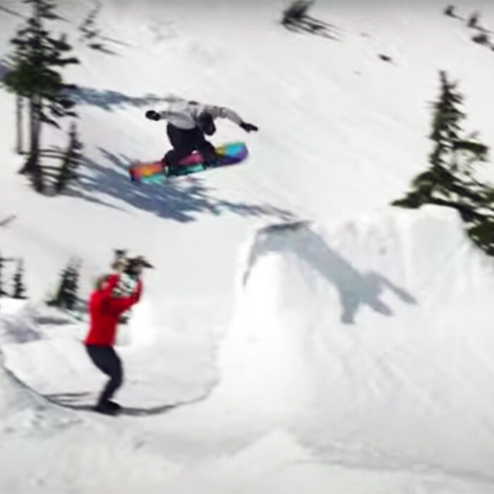 A snowboarder hits a feature at the Brain Bowl Sessions at Mt. Baker