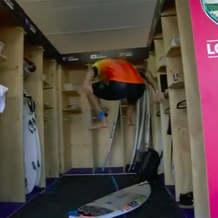 Italo Ferreira jumps on his surfboard and breaks it