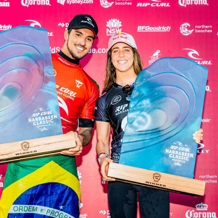 Gabriel Medina and Caroline Marks on the victors stand in Narrabeen