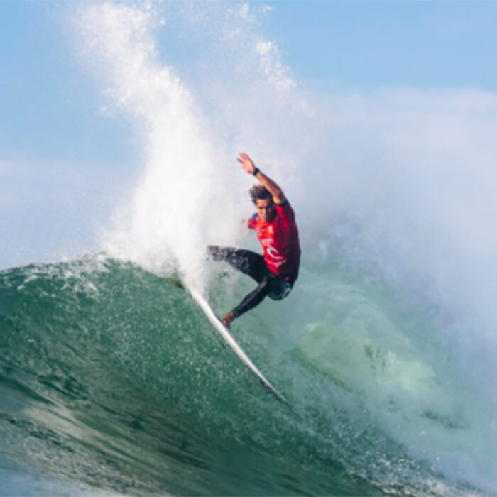 Morgan Cibilic surfing a wave at Newcastle