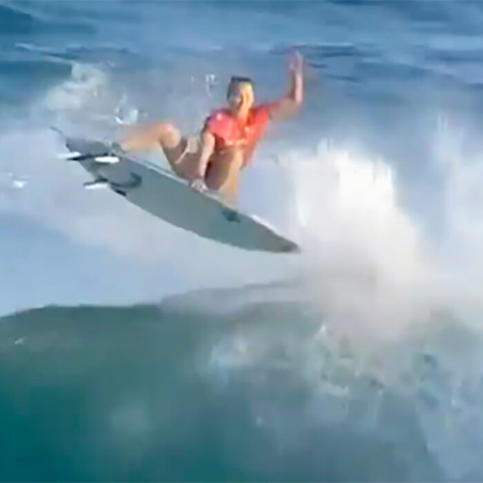 Carissa Moore throws an air on a wave in Newcastle