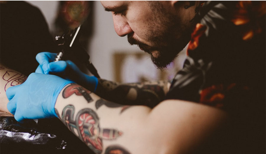Surfing After a Tattoo: How Long Should You Wait?