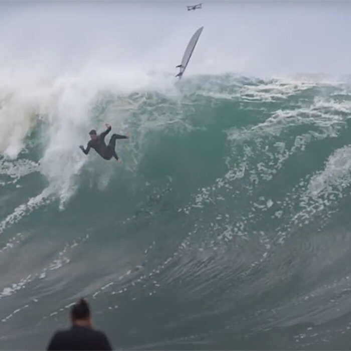 Surfer falling at the Wedge