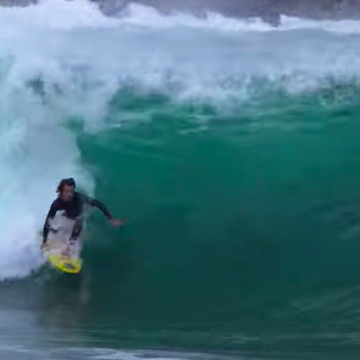 Mason Ho pulls into a barrel at the Wedge