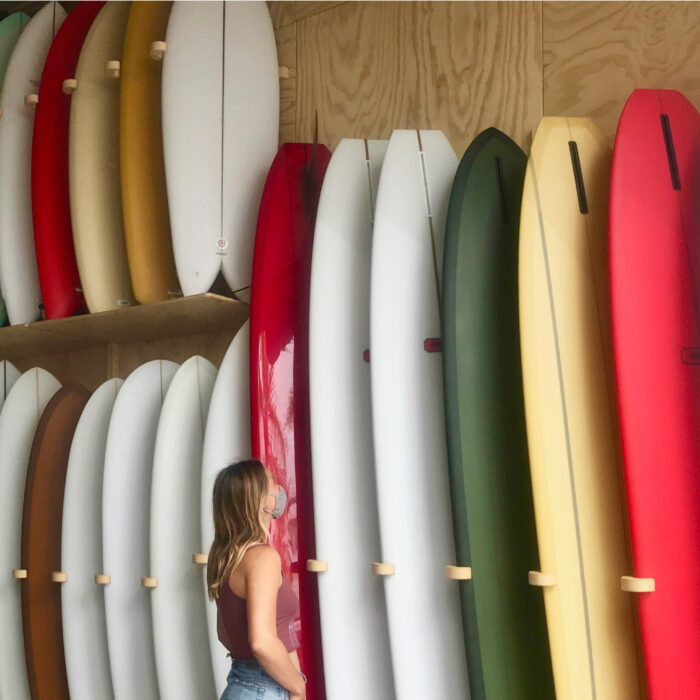 girl in surf shop