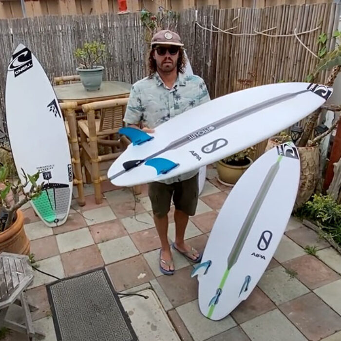 Timmy Reyes with Flat Earth Surfboard