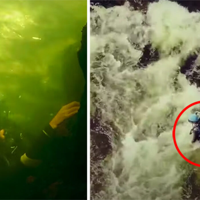 A scuba diver runs a river