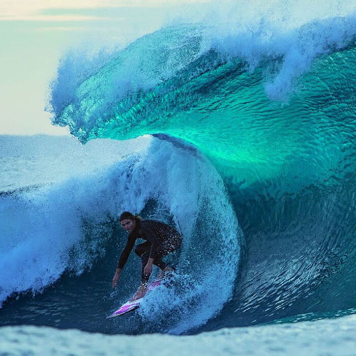 Noa Deane surfing