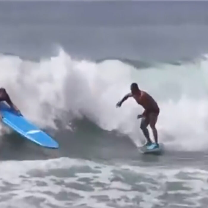 a dude gets slammed in the surf