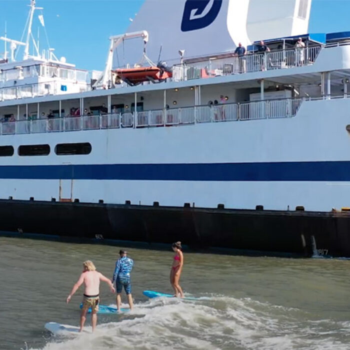 Jamie O'Brien, Ben Gravy, and Tina Cohen ferry surfing in New Jersey
