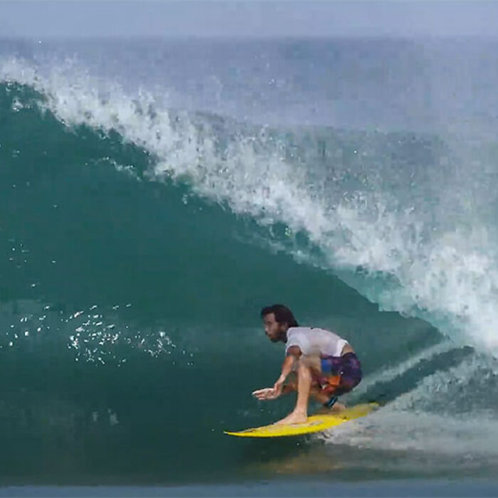 Mason Ho surfing a point break in Mexico