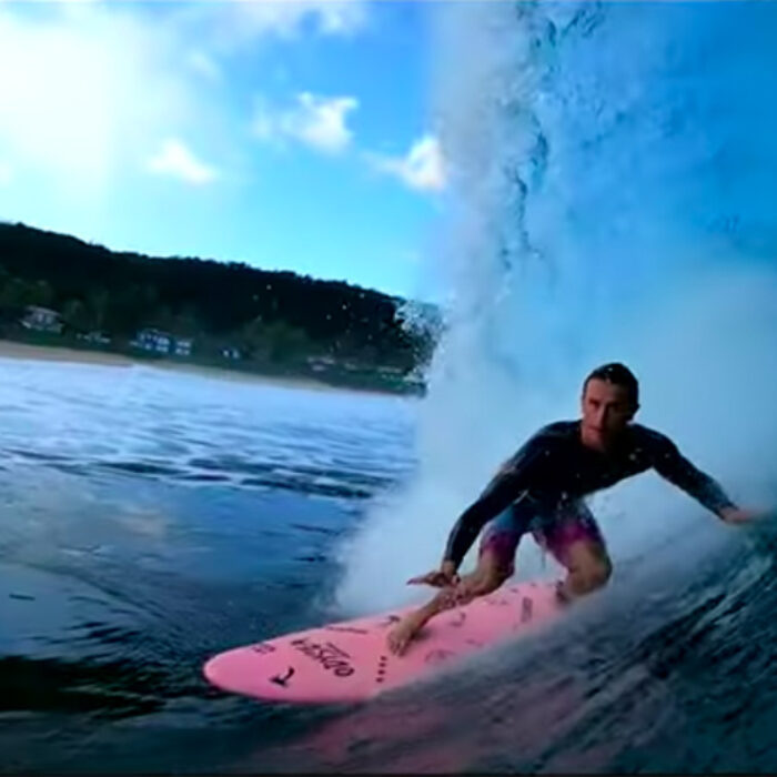 A surfer gets a barrel at Pipeline on the North Shore