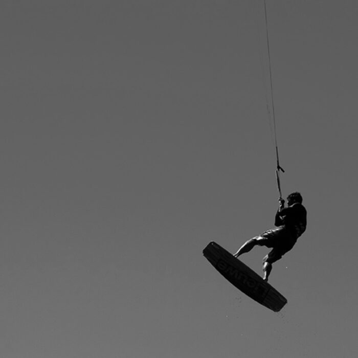 A kitesurfer gets air