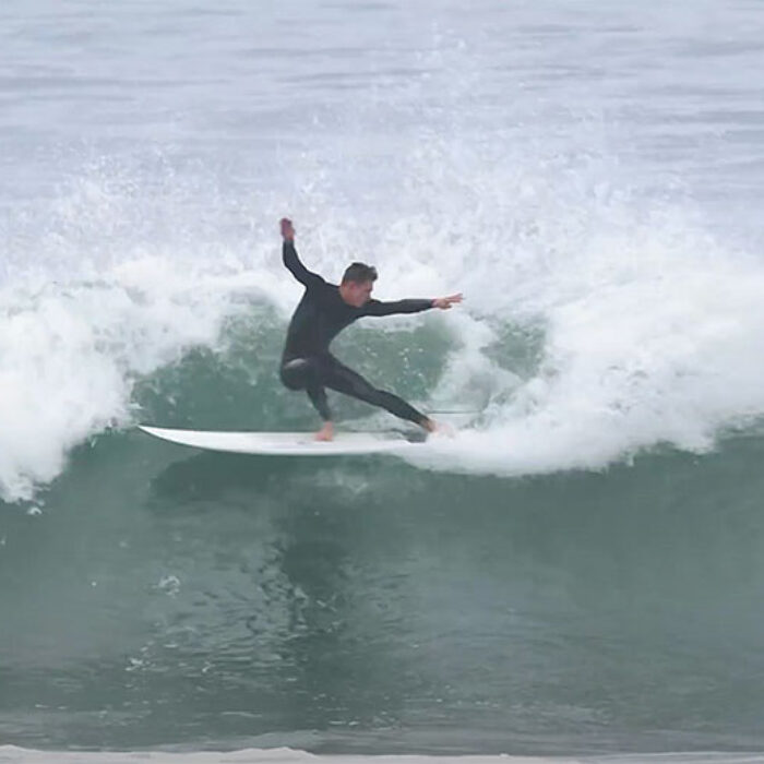 Kevin Schulz surfing mid-length surfboard