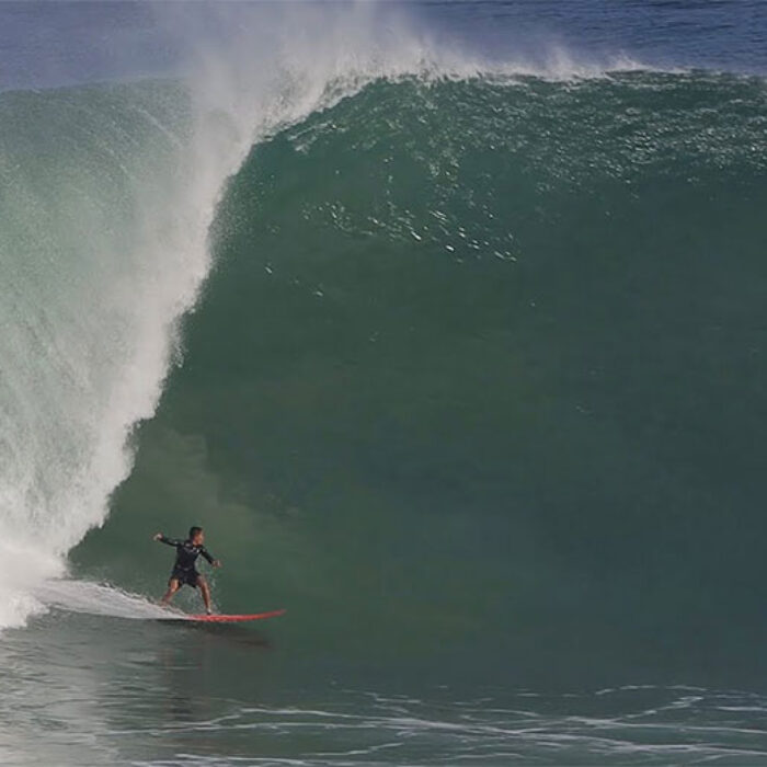 Uluwatu surfer on big wave
