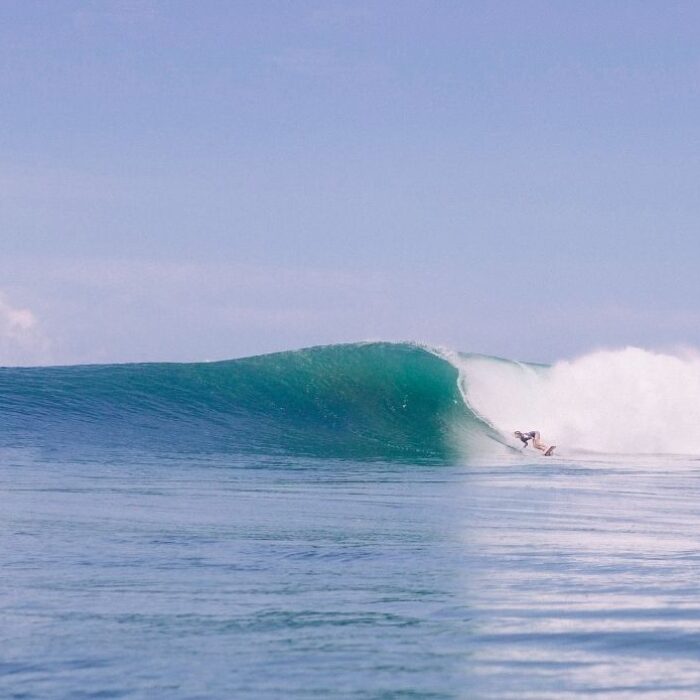 Leah Dawson surfing bottom turn Las Flores El Salvador