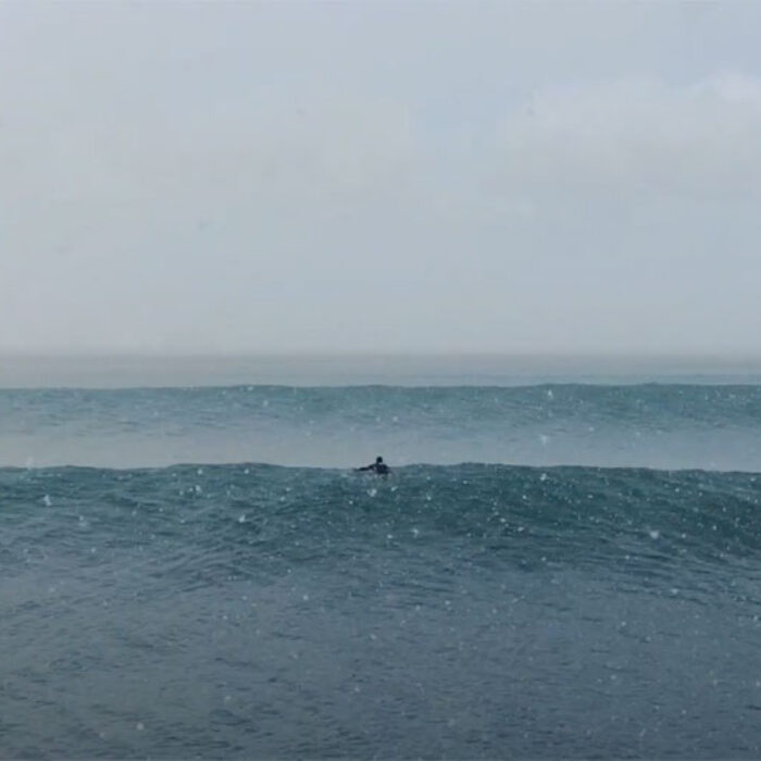 Ian Battrick surfing in the Arctic